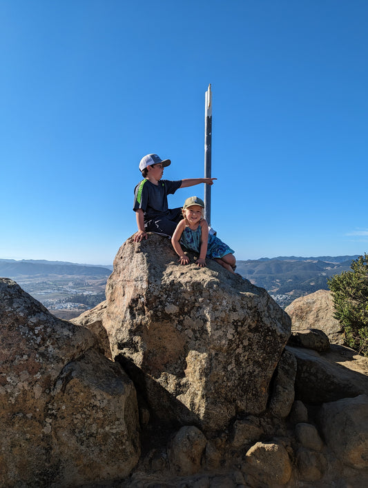 Joy and Rocko on the top of Cerro San Luis peak (Madonna Mountain) in San Luis Obispo, California